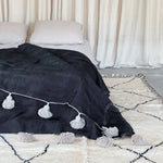 Load image into Gallery viewer, Pom pom blanket black and beige
